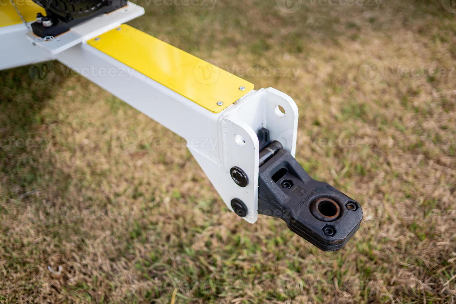 Close up of new tractor hitch. Big metal hitch close-up shot. photo