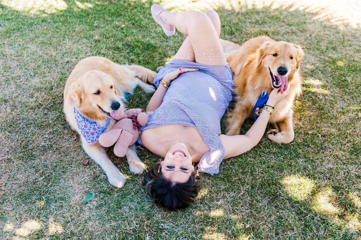 Pregnant woman with dog photo