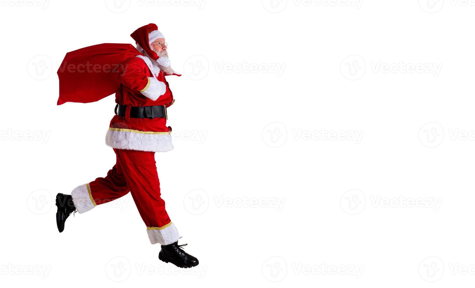 Santa Claus running on white background photo