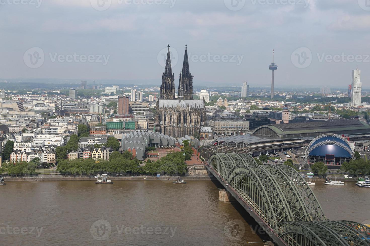 Hohenzollern Bridge and Cologne Cathedral in Cologne, Germany photo