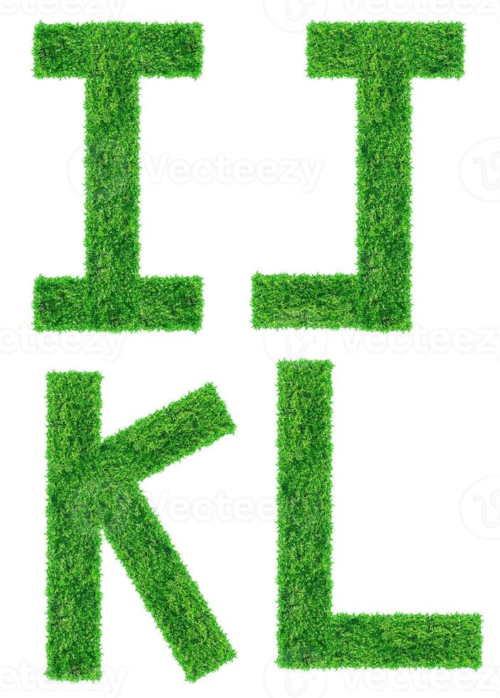 Alphabet from the green grass,  isolated on white background photo