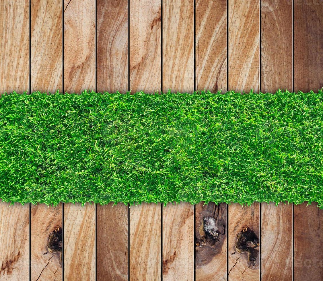 wooden with green grass background photo