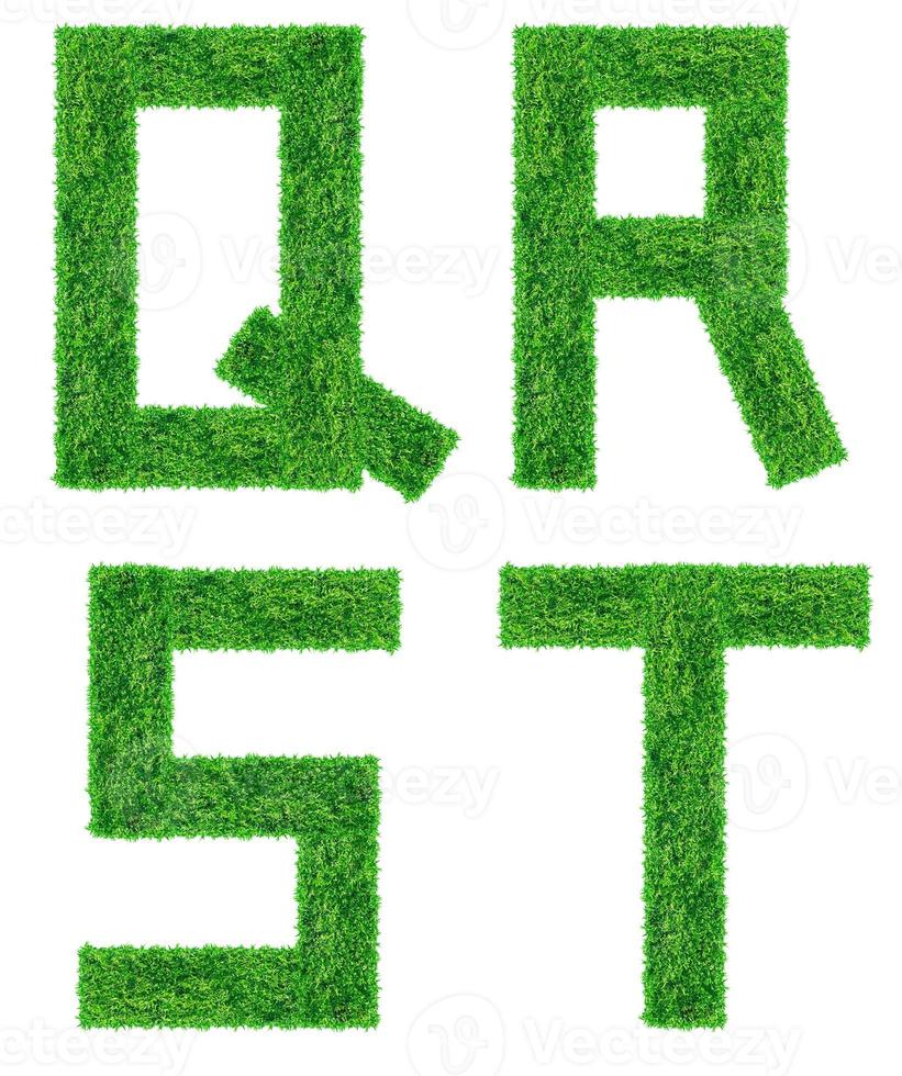 Alphabet from the green grass,  isolated on white background photo