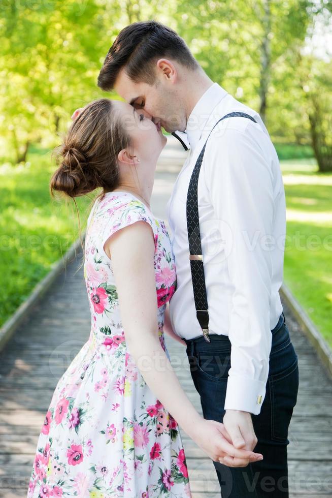 Young couple in love together, holding hands. photo