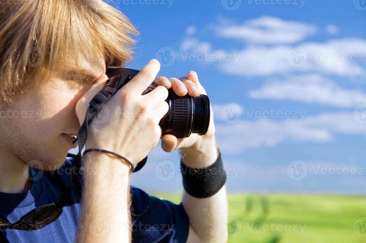 Photographer taking pictures photo