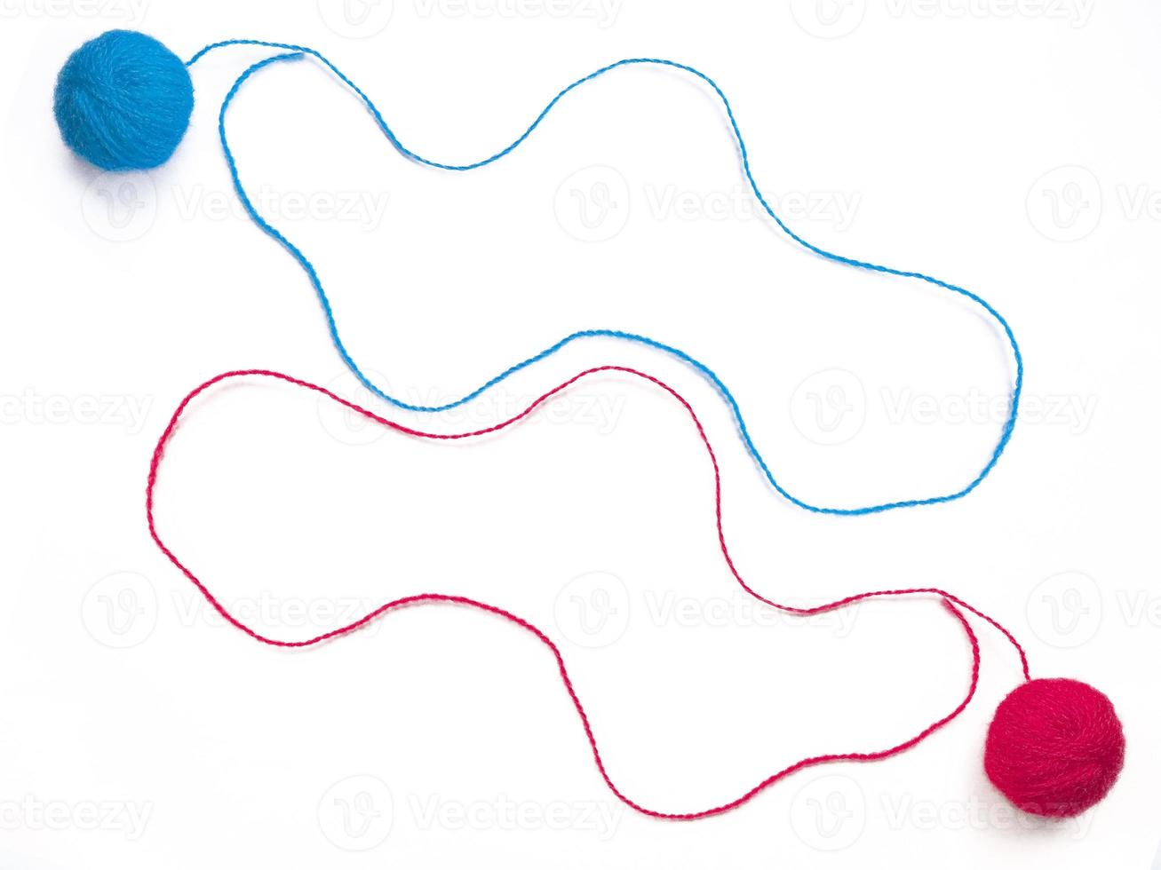 Two of knitting yarn on white background photo