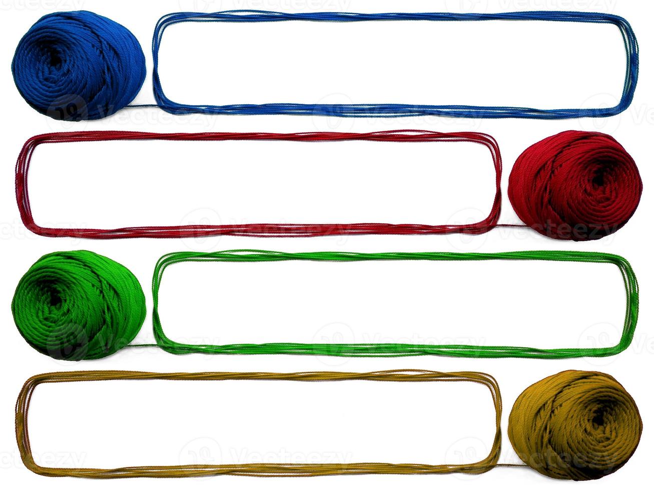 four of knitting yarn on white background photo