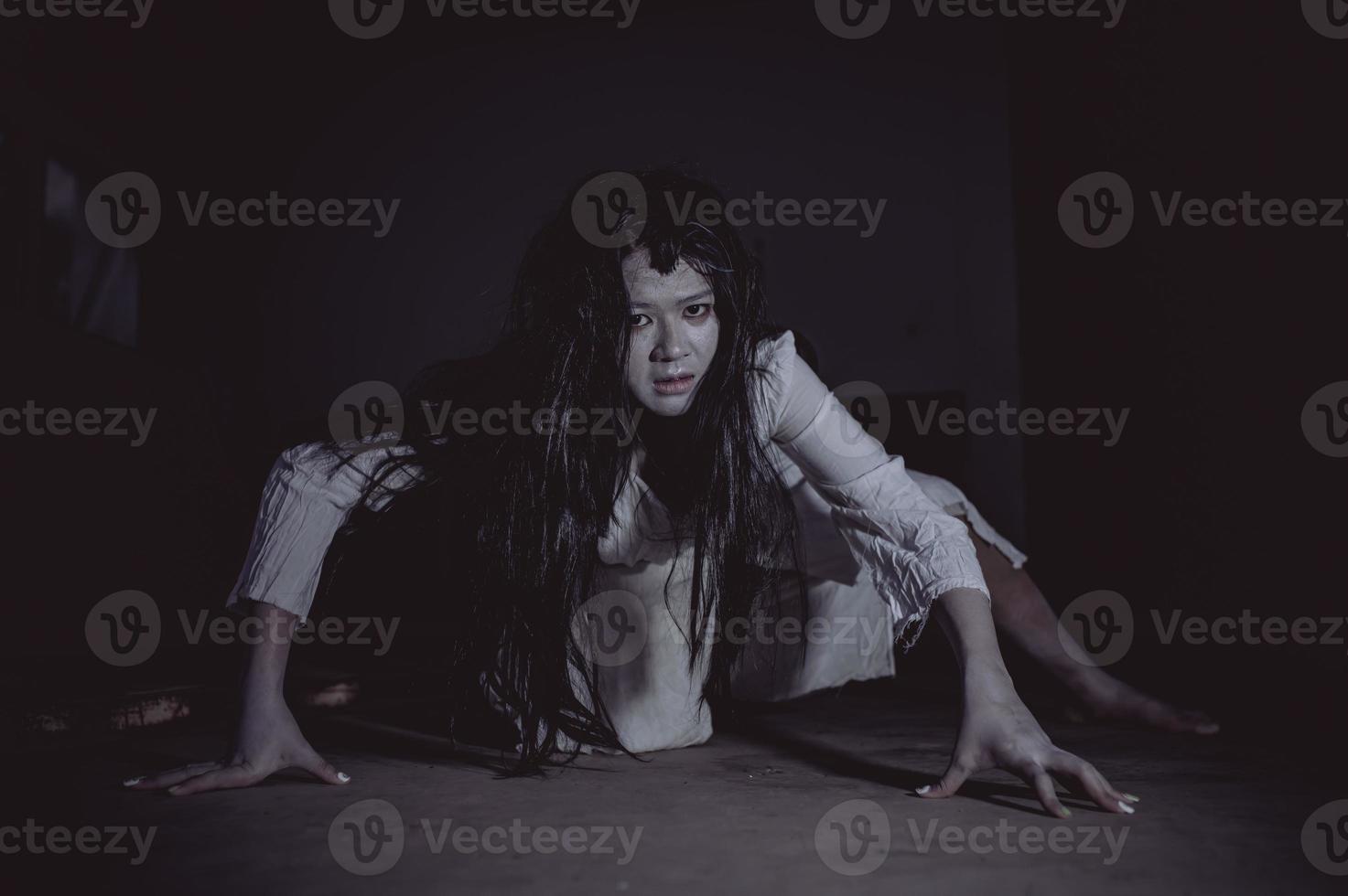 Portrait of asian woman make up ghost,Scary horror scene for background,Halloween festival concept,Ghost movies poster photo