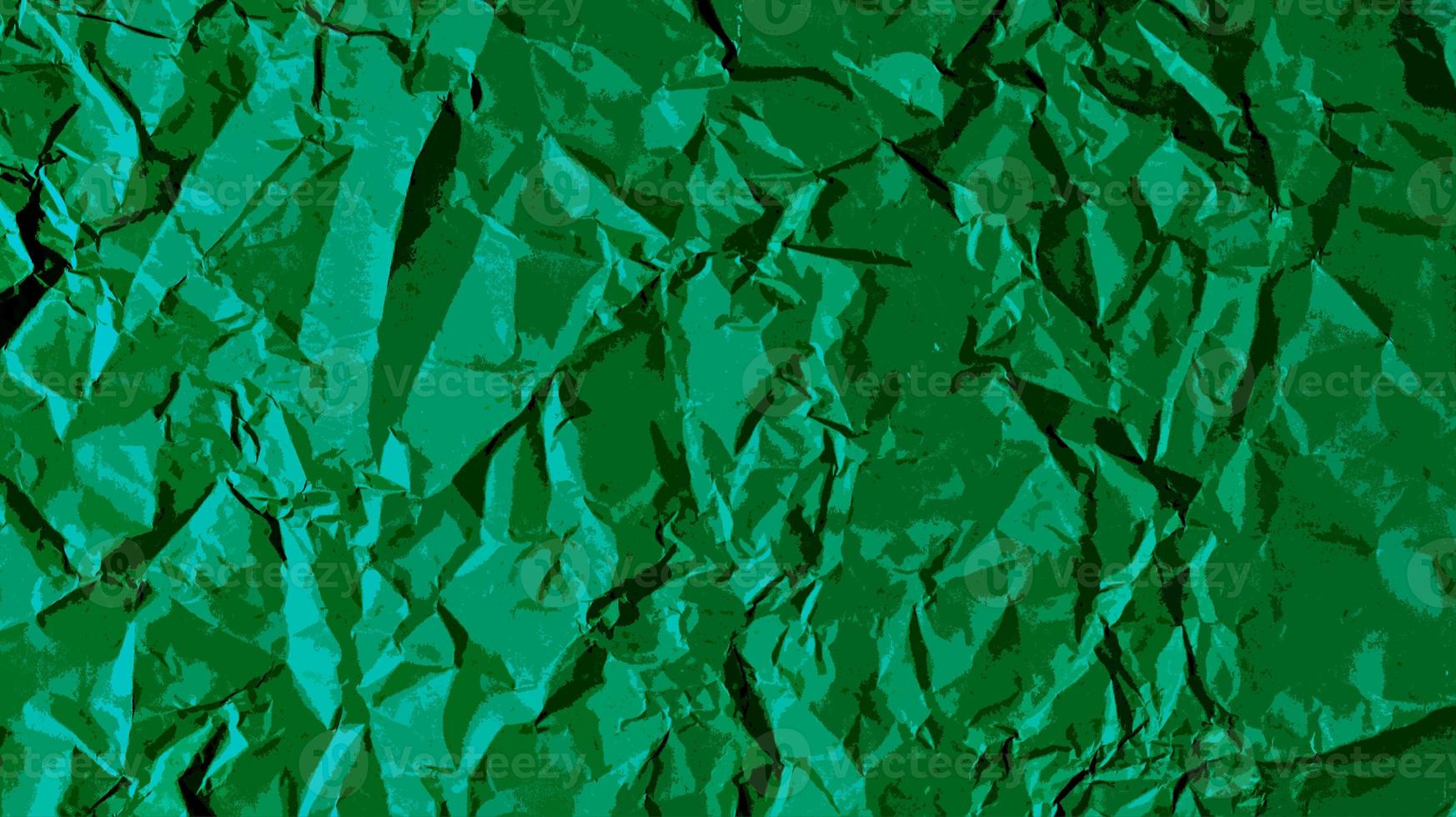 The green art paper background is wrinkled, creating a rough texture
