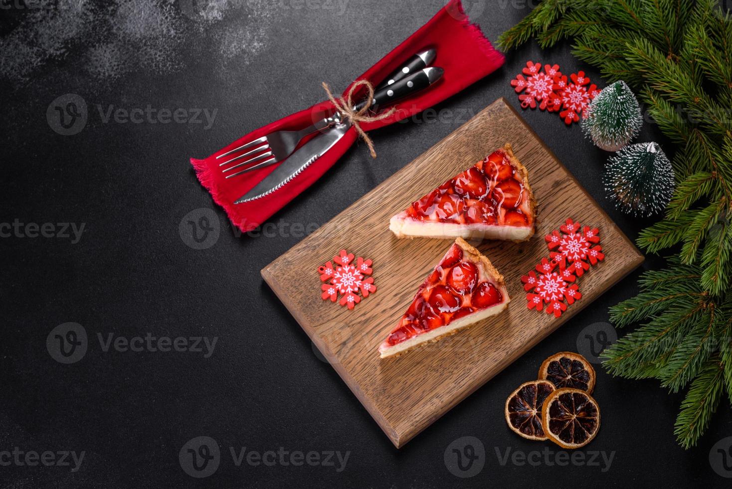 Delicious christmas strawberry tart on concrete background, top view, copy space photo