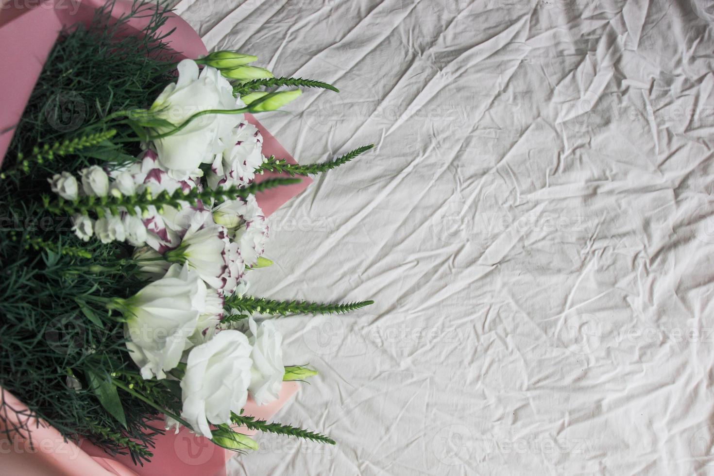 Festive white bouquet of flowers on a light background, pink color bouquet, background, flowers white photo