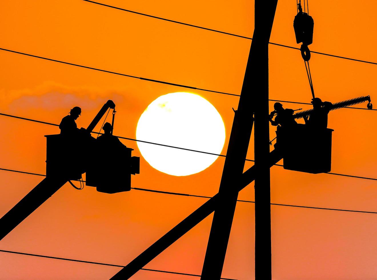 Utility Workers at Sunrise photo