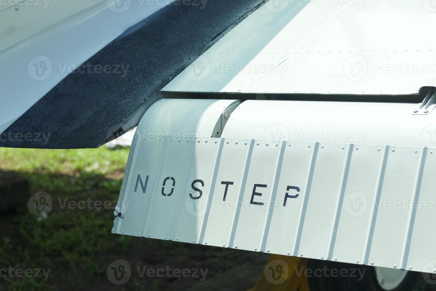Close up image of an airfoil of an old aircraft. photo