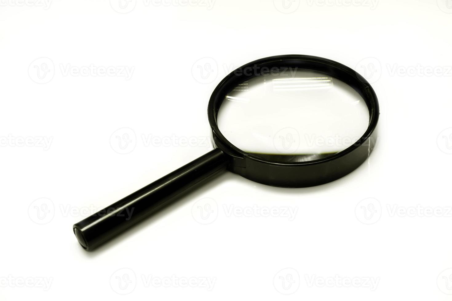 Magnifying glass isolate on white background and make with paths. photo