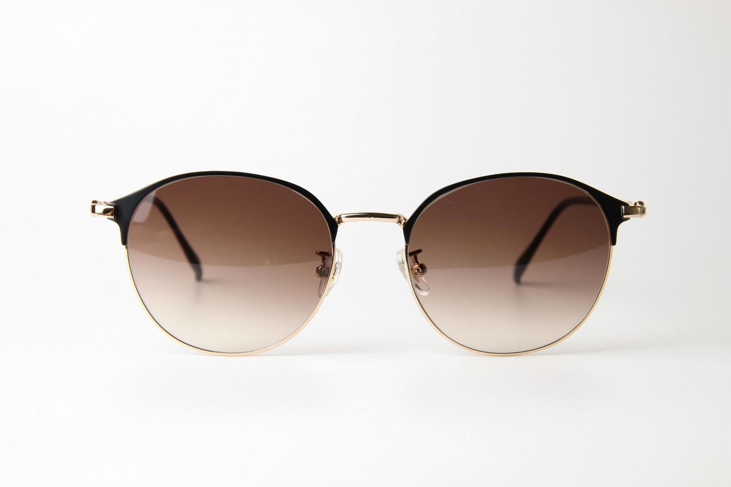 Sunglasses on white background photo
