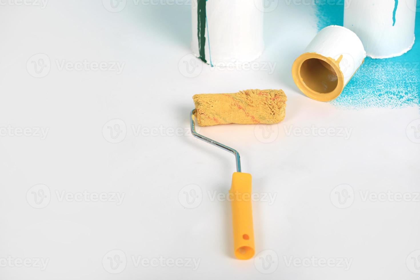 Instruments for renovation apartment room isolated on white and blue background. accessories for gluing, painting tools. Colorful paint cans. Concept of repair home. Copy space for advertisement photo