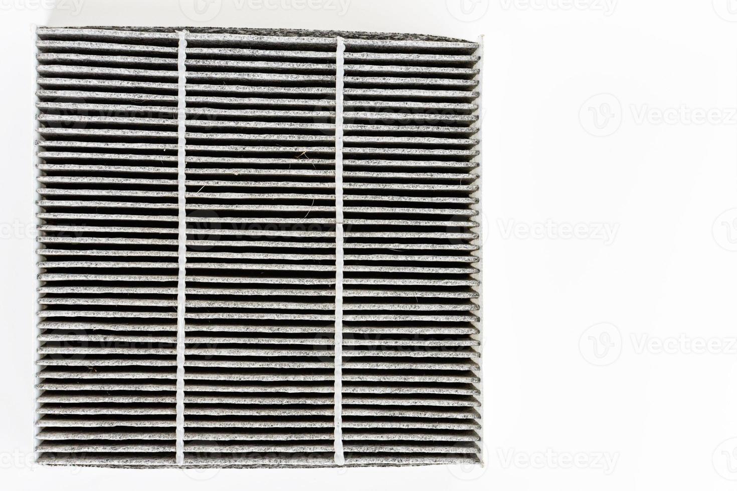 Car air filter. Through use, there are stains and dirt. Bad smell inside the car. Changing and cleaning the car air filter to purify air and prevent disease in the car. Close up, copy space on right photo