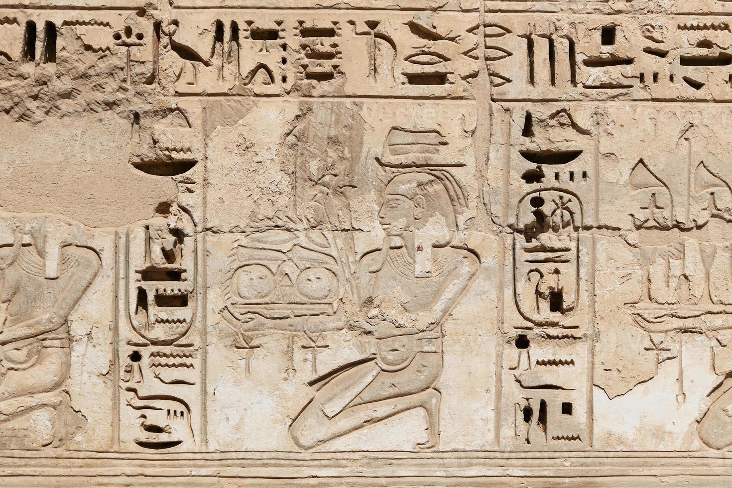 Egyptian Hieroglyphs in Medinet Habu Temple, Luxor, Egypt photo