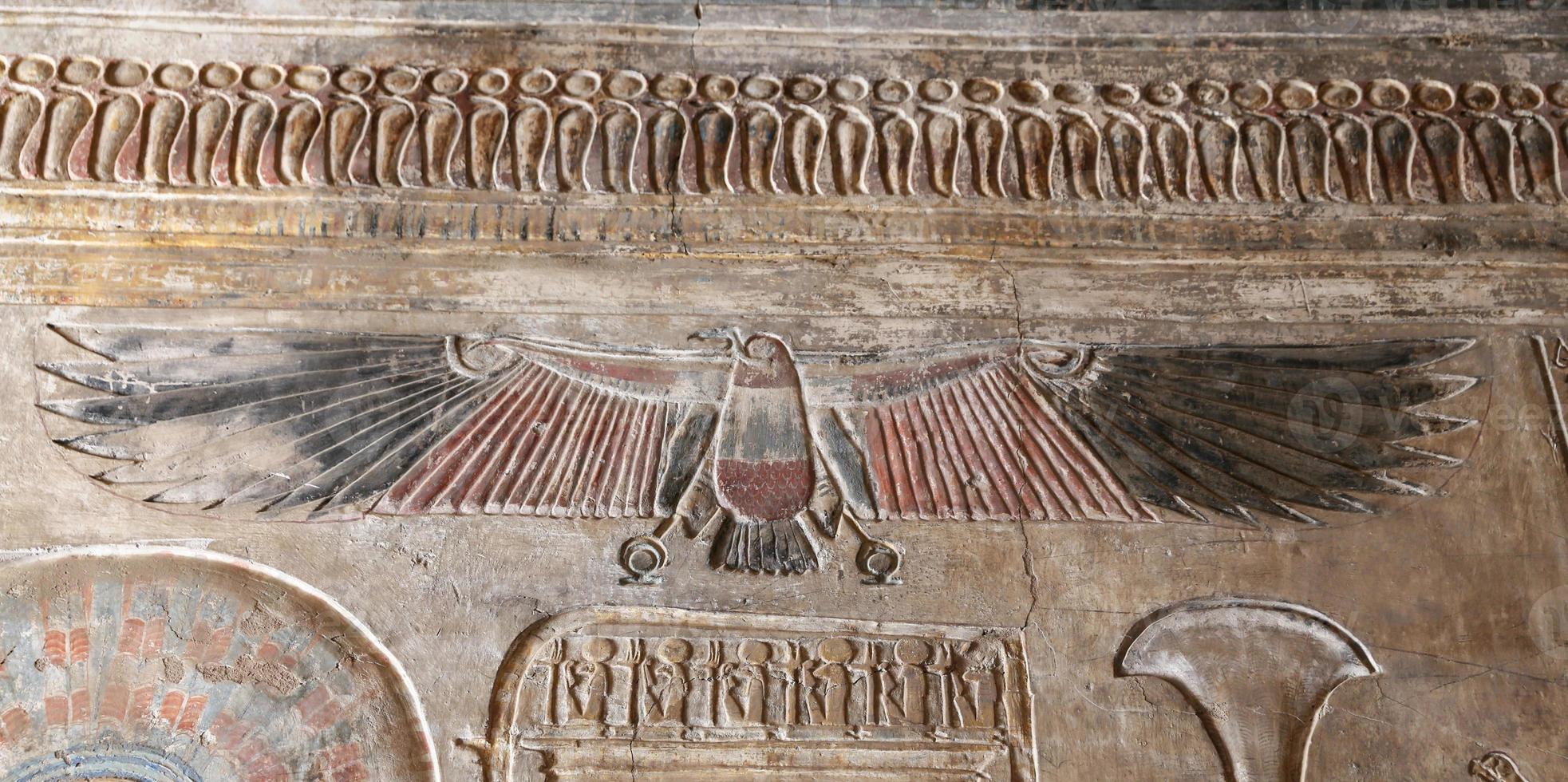 Egyptian Hieroglyphs in Medinet Habu Temple, Luxor, Egypt photo