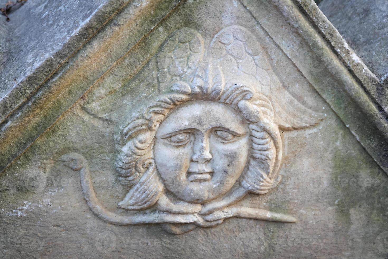 Face Relief over Sarcophagus in Istanbul Archaeology Museum, Turkey photo