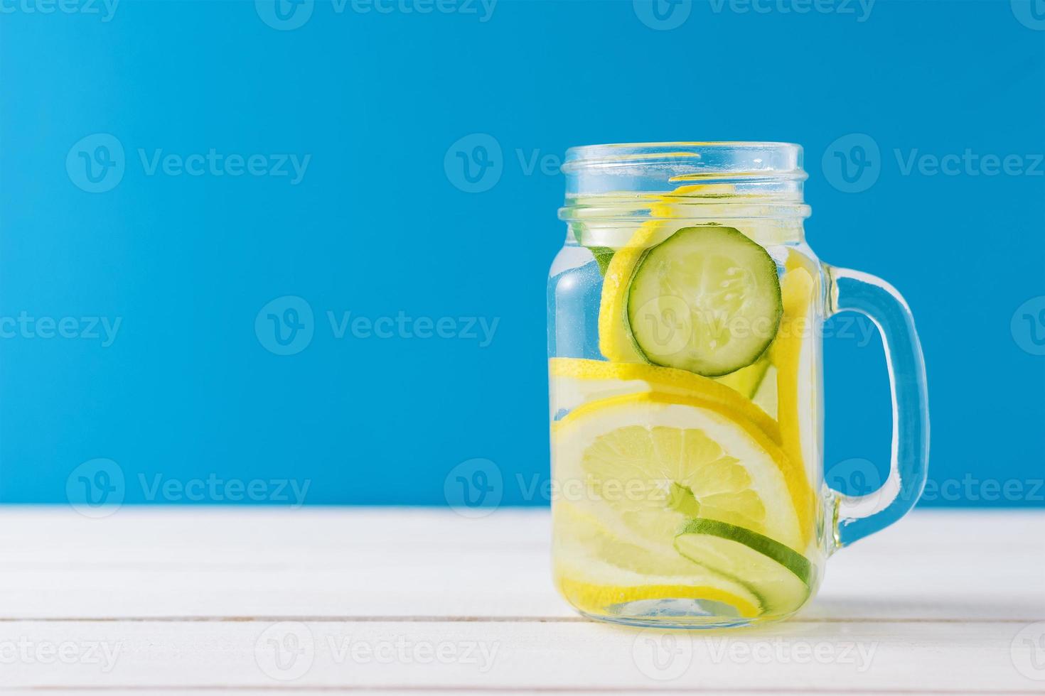 jar of detox water with lemon and cucumber photo