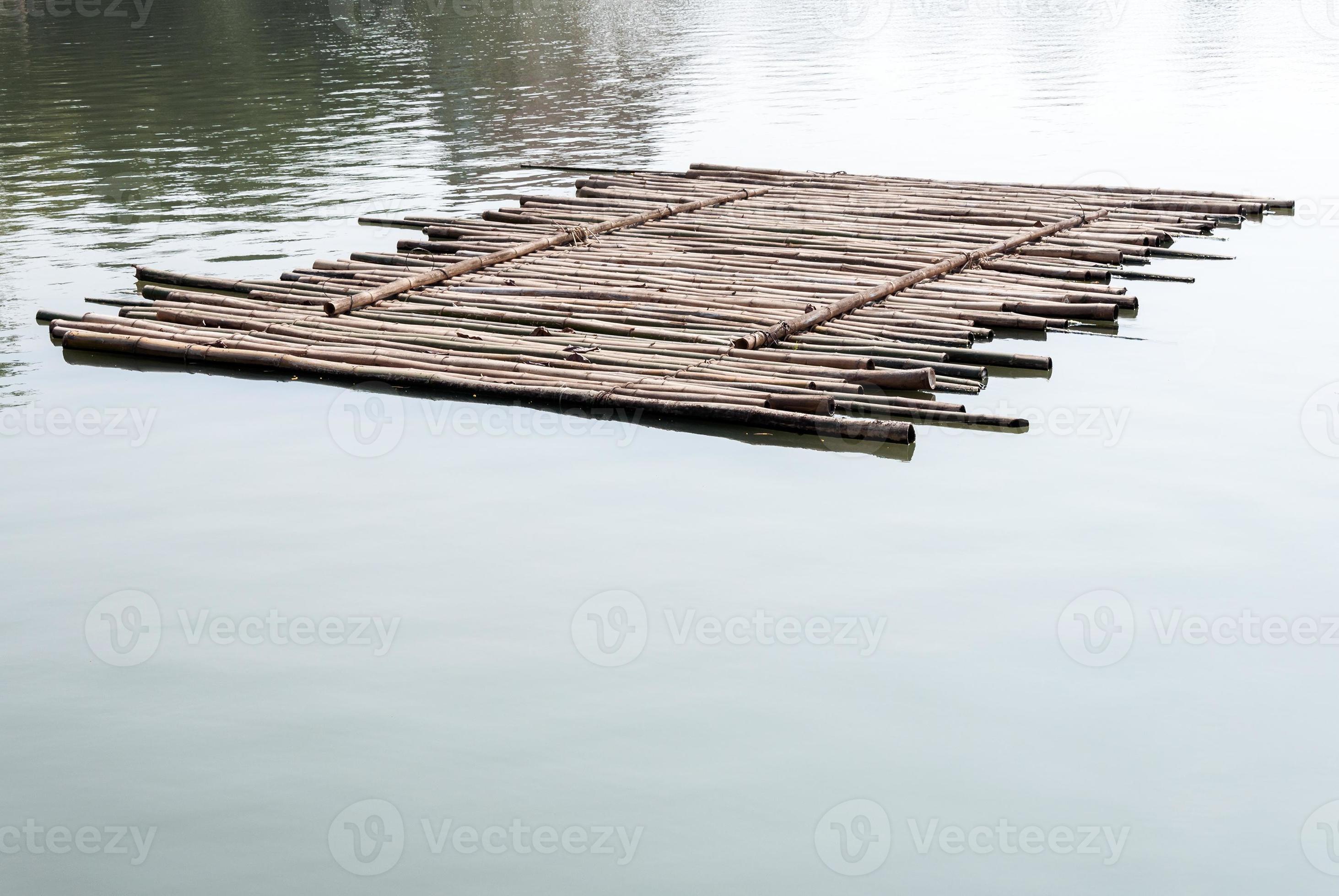 Old bamboo raft 9392269 Stock Photo at Vecteezy