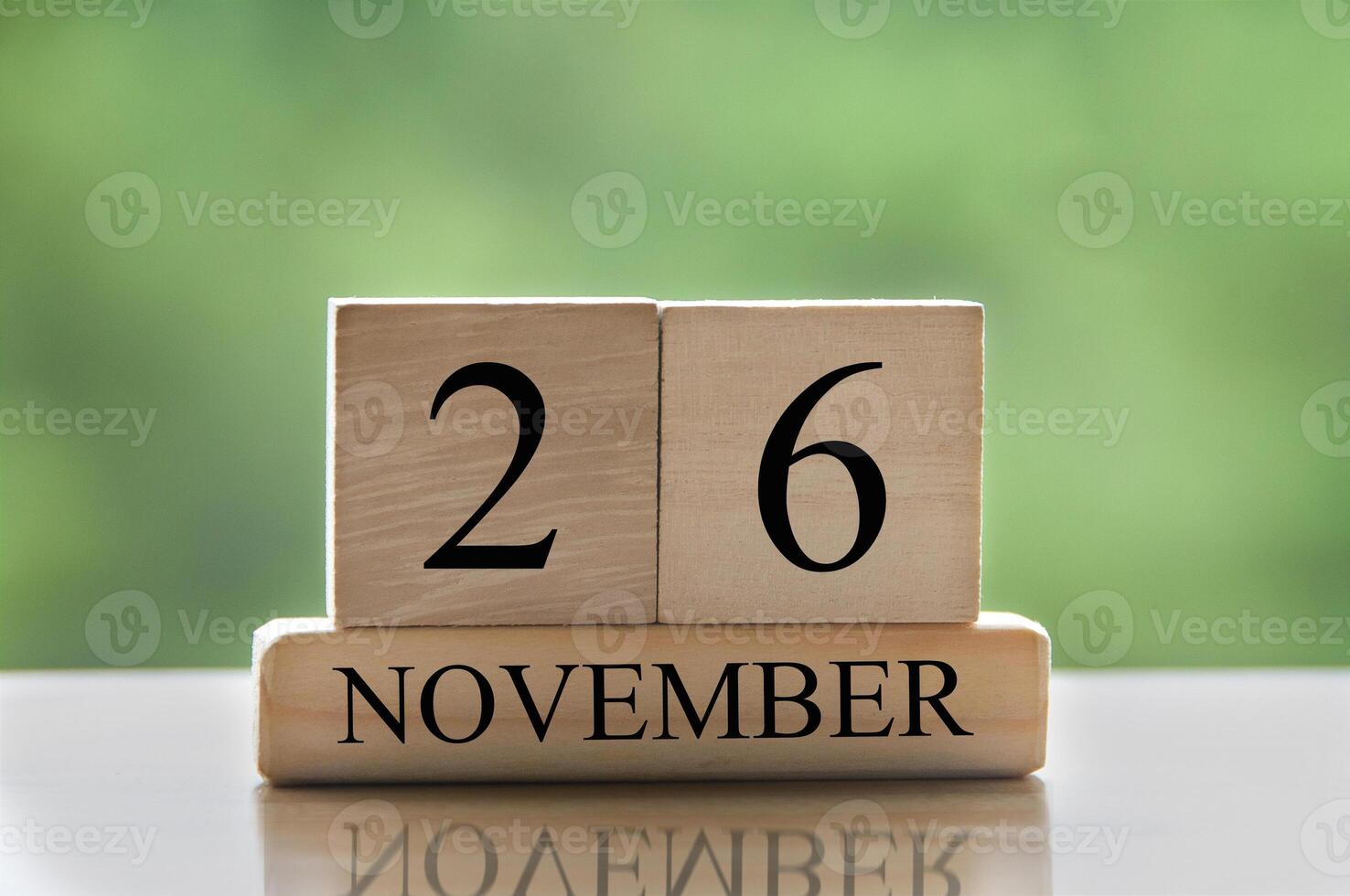 November 26 calendar date text on wooden blocks with copy space for ideas or text. Copy space photo