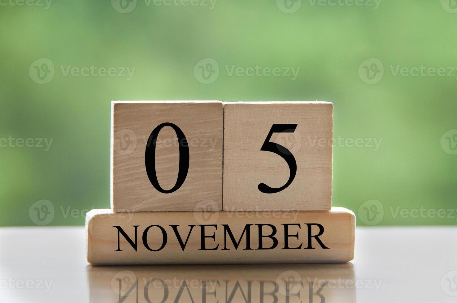 November 5 calendar date text on wooden blocks with copy space for ideas or text. Copy space photo