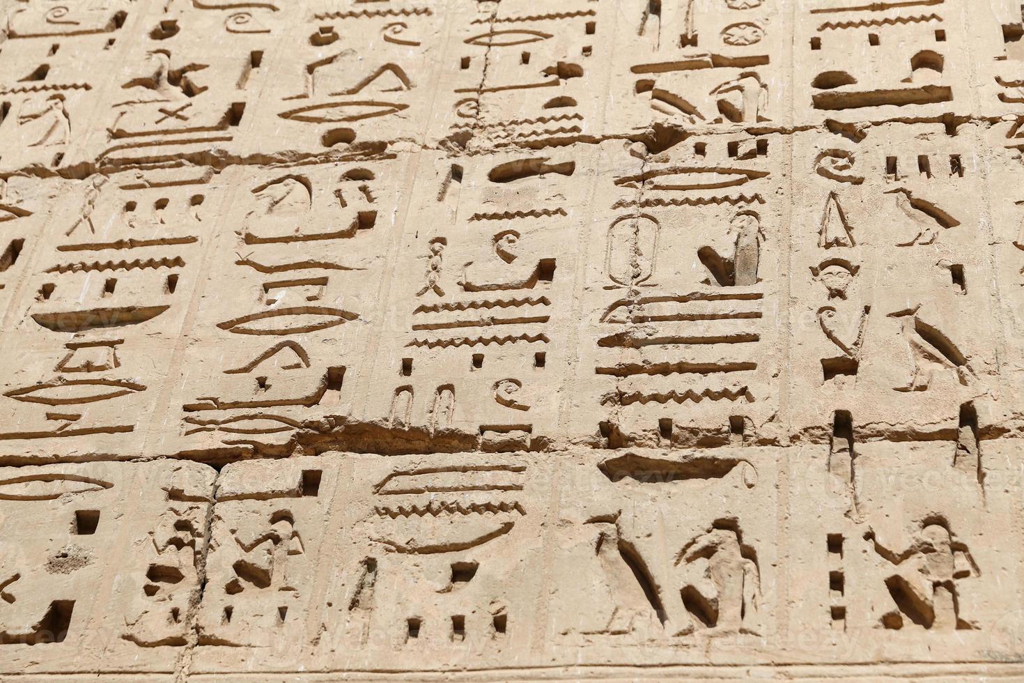 Egyptian Hieroglyphs in Medinet Habu Temple, Luxor, Egypt photo