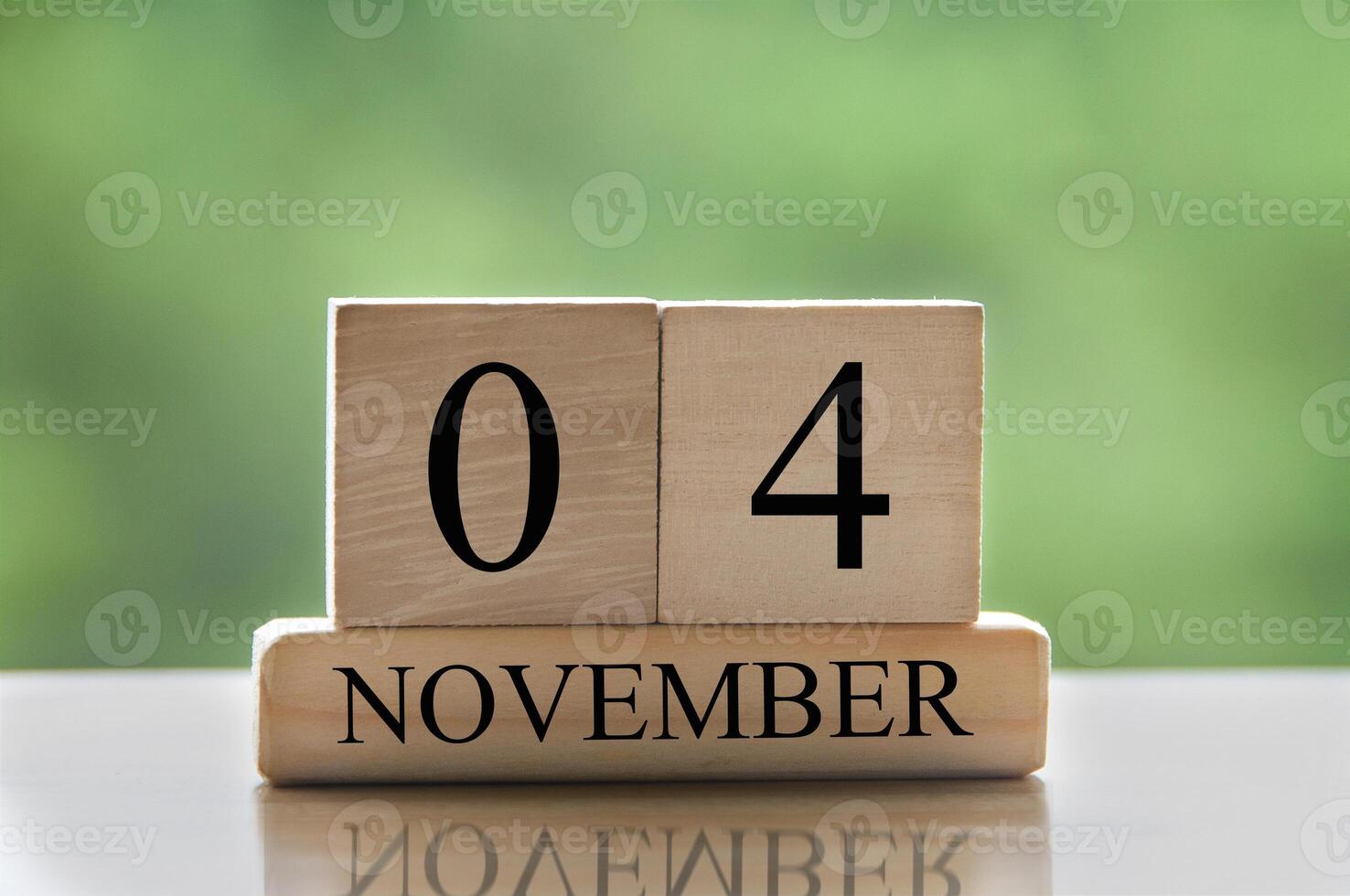 November 4 calendar date text on wooden blocks with copy space for ideas or text. Copy space photo