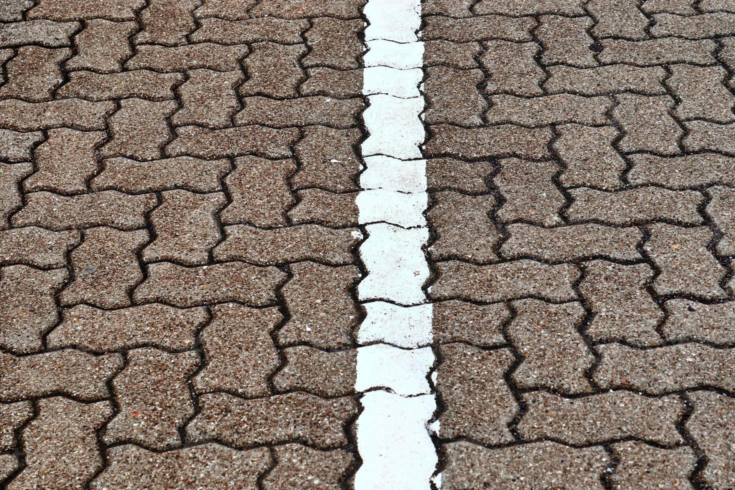 Detailed close up on old historical cobblestone roads and walkways photo