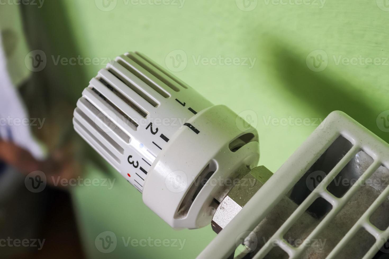 Close-up view of a heater thermostat. photo