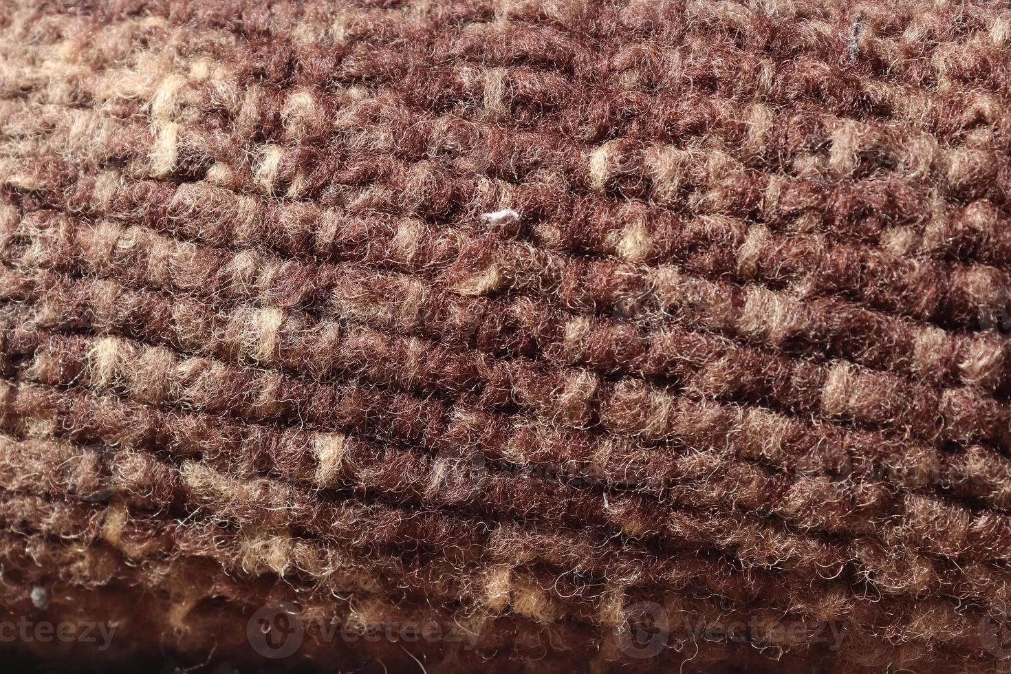 Detailed close up view on samples of cloth and fabrics in different colors found at a fabrics market photo