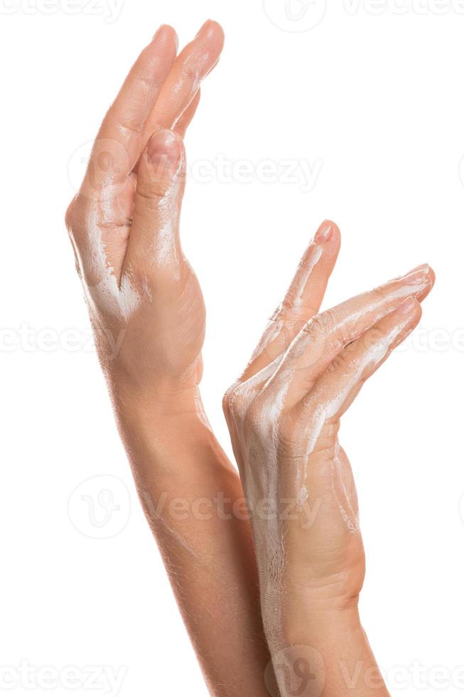 Female hands and moisturizing cream photo