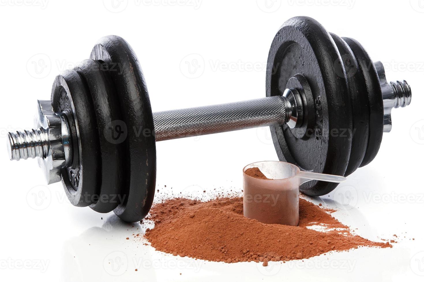 Dumbell and protein powder photo