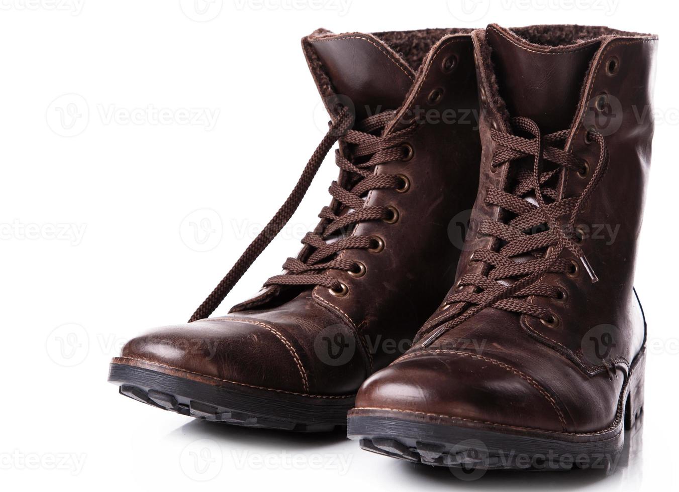 Leather boots on white background photo