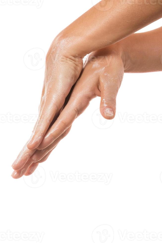 Female hands and moisturizing cream photo