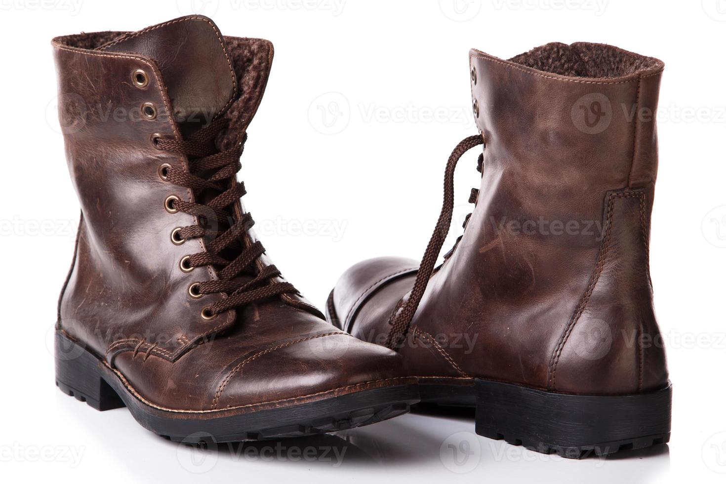 Leather boots on white background photo