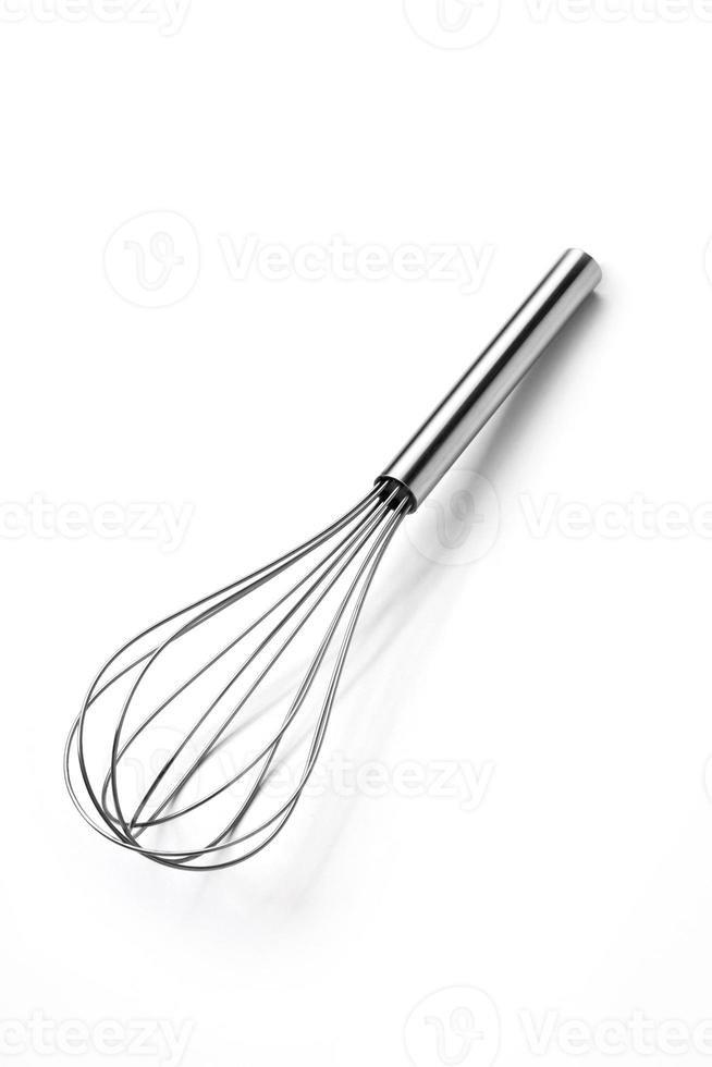 Stainless steel egg beater or egg whisk photo