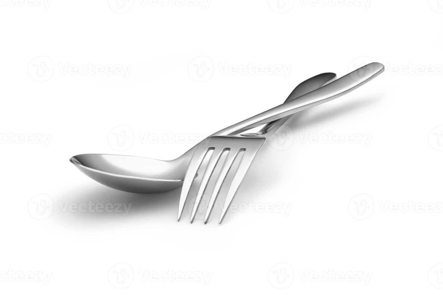 Spoon, and fork on a white background photo