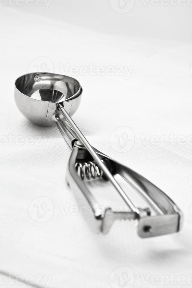 ice cream scoop isolated on white photo