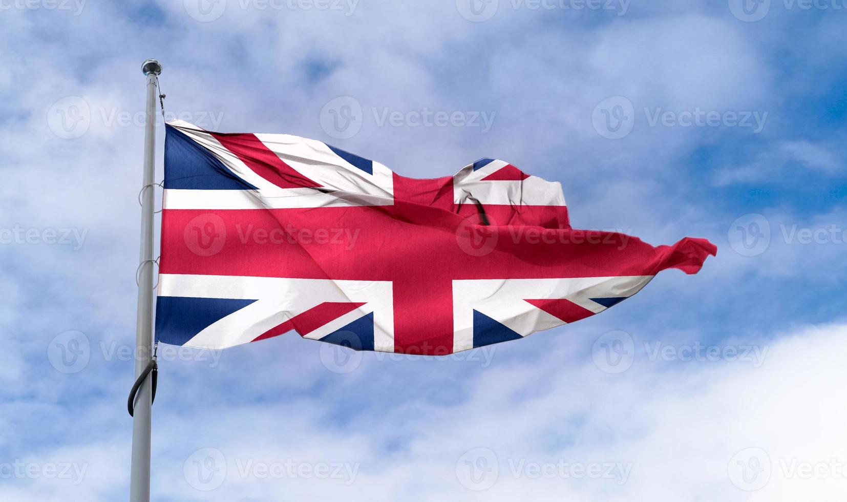 United Kingdom flag - realistic waving fabric flag. photo