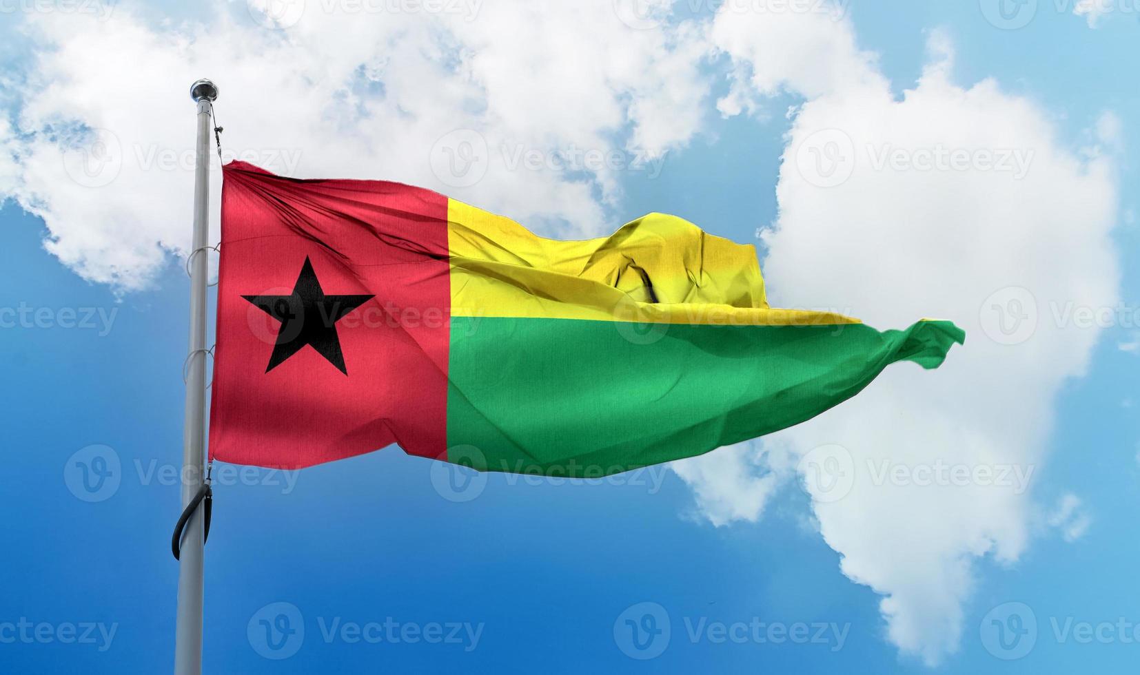 Guinea-Bissau flag - realistic waving fabric flag. photo