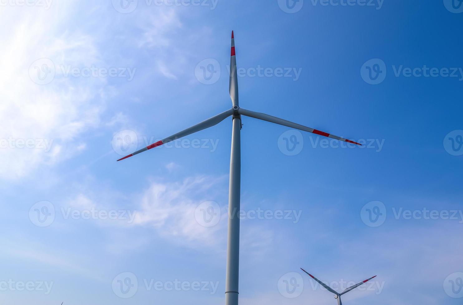 Panoramic view on alternative energy wind mills in a windpark in northern europe photo