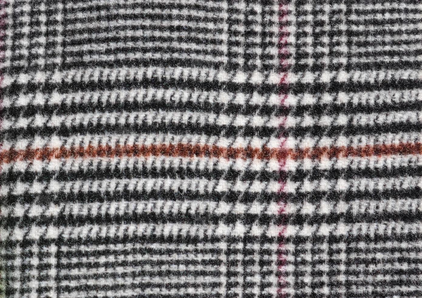 Detailed close up view on samples of cloth and fabrics in different colors found at a fabrics market photo