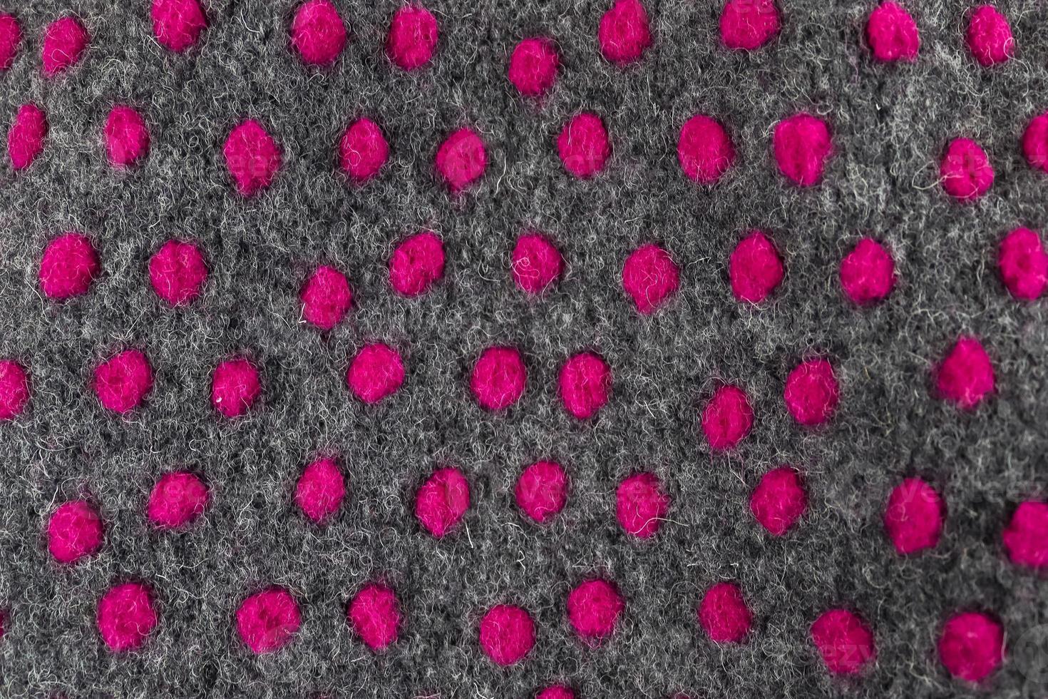 Close up view on samples of cloth and fabrics in different colors found at a fabrics market photo