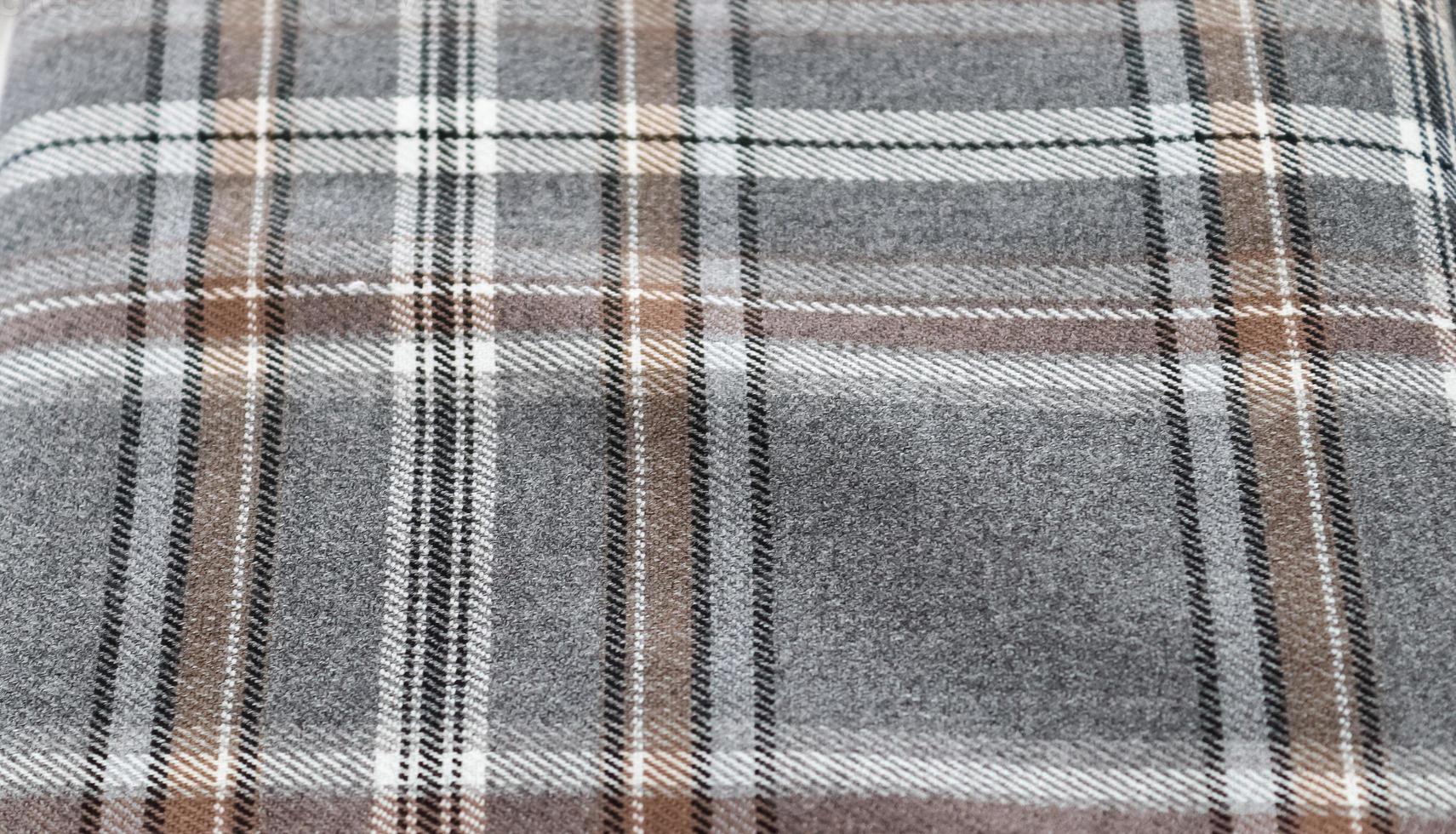 Detailed close up view on samples of cloth and fabrics in different colors found at a fabrics market photo