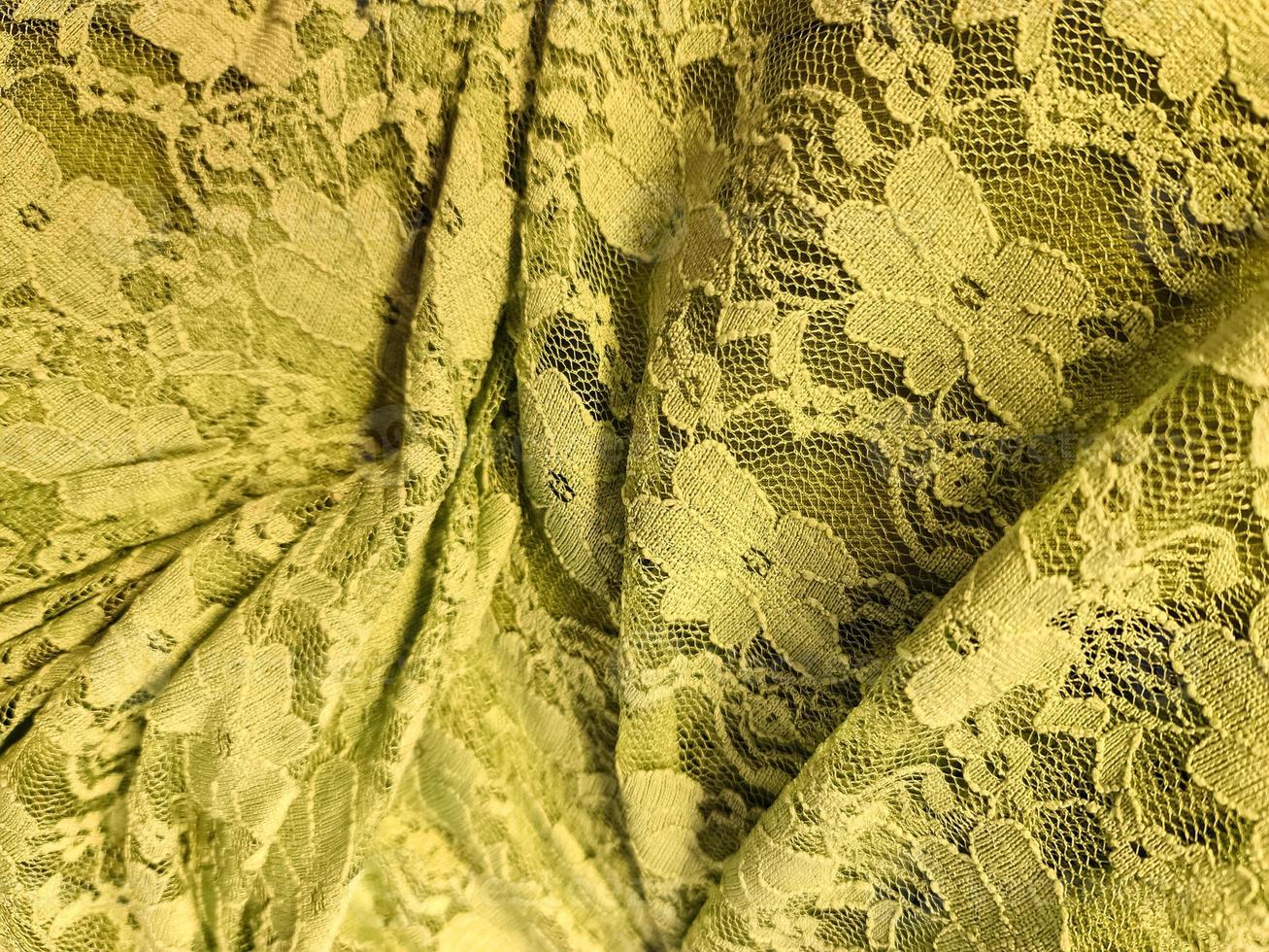 Detailed close up view on samples of cloth and fabrics in different colors found at a fabrics market photo
