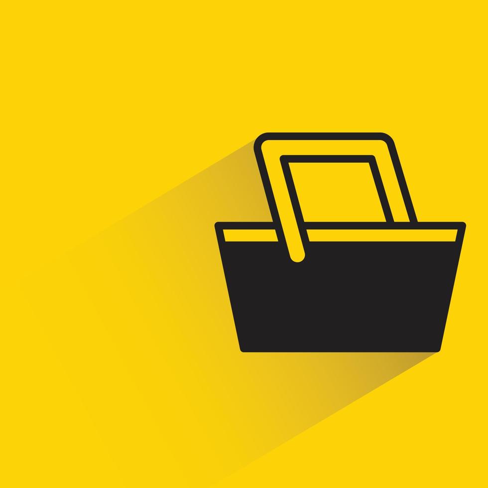 shopping basket icon on yellow background vector illustration