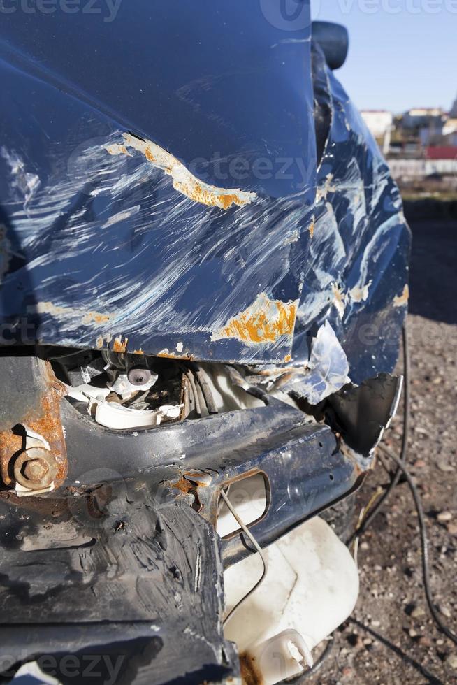 blue car after an accident photo